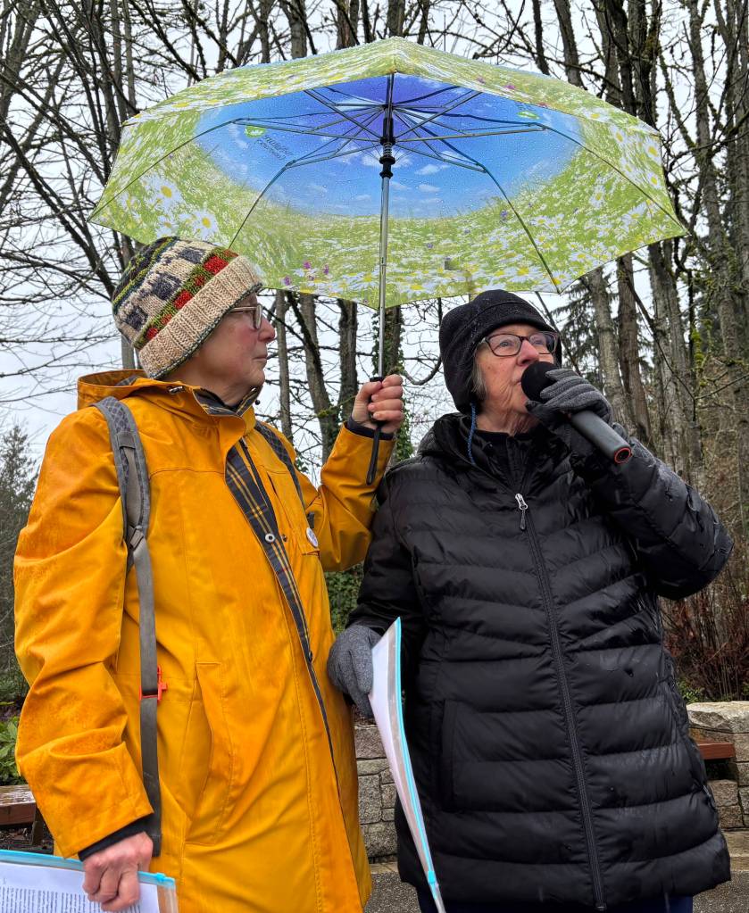 Claudia Gorbman (left) and Pam Keeley (right) share prepared speeches that condemned both the events of Jan. 6, 2021, and other actions by the Trump administration.