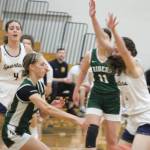 Luke Caputo/Kitsap News Group photos
Spartans Elsa Drugge and Camille Carey defend a Port Angeles player in a 51-36 Bainbridge home loss to the Roughriders Jan. 7.