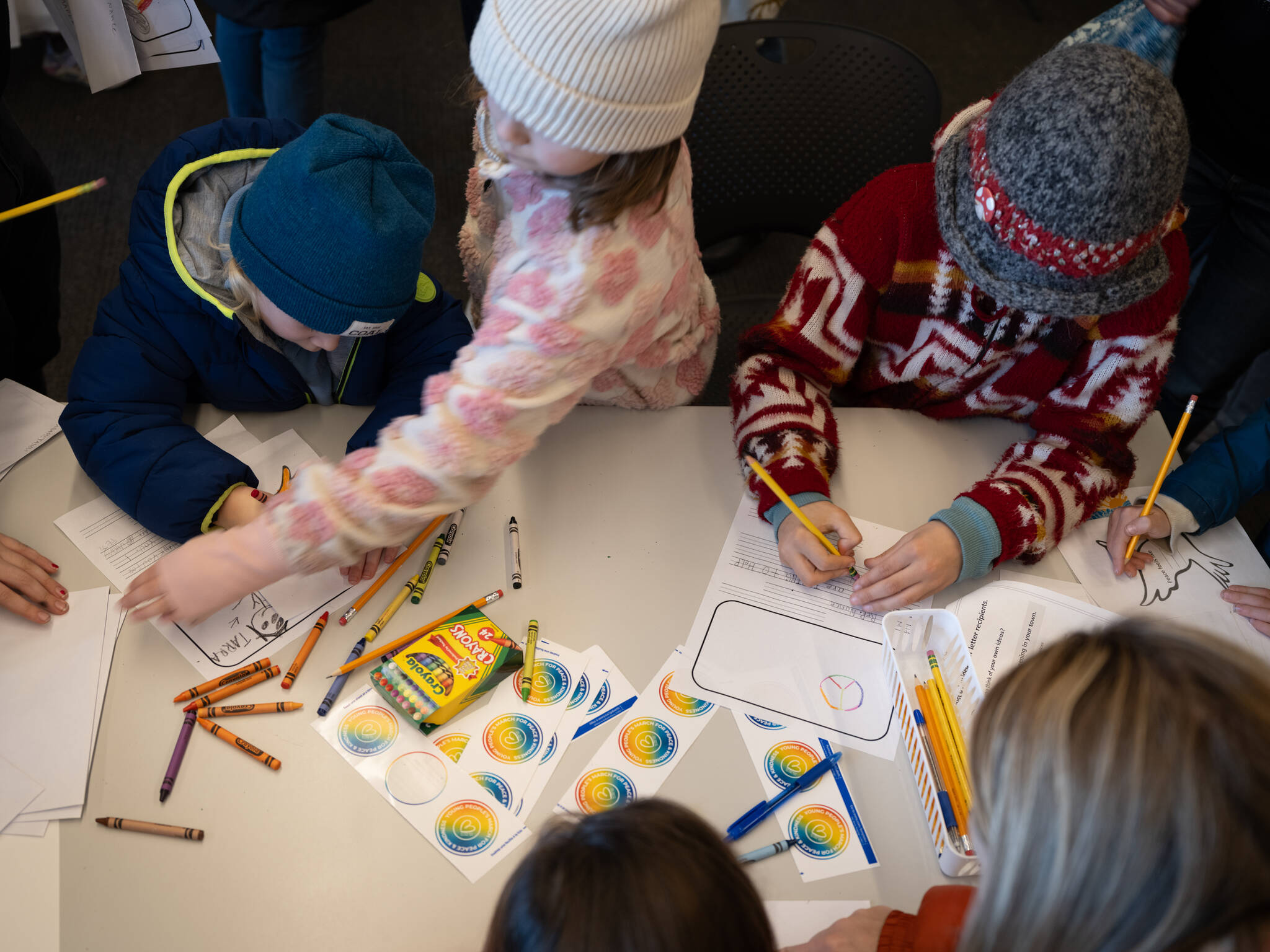 BISD courtesy photo
Kids write letters during a previous Young Peoples March for Peace and Kindness on Bainbridge Island.
