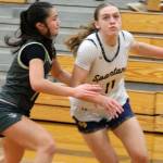 Luke Caputo/Kitsap News Group photos
Spartan Ada Reitz drives the ball to the hoop with Viking Abby Marrero defending in a 47-25 Bainbridge home win over North Kitsap Jan. 13.