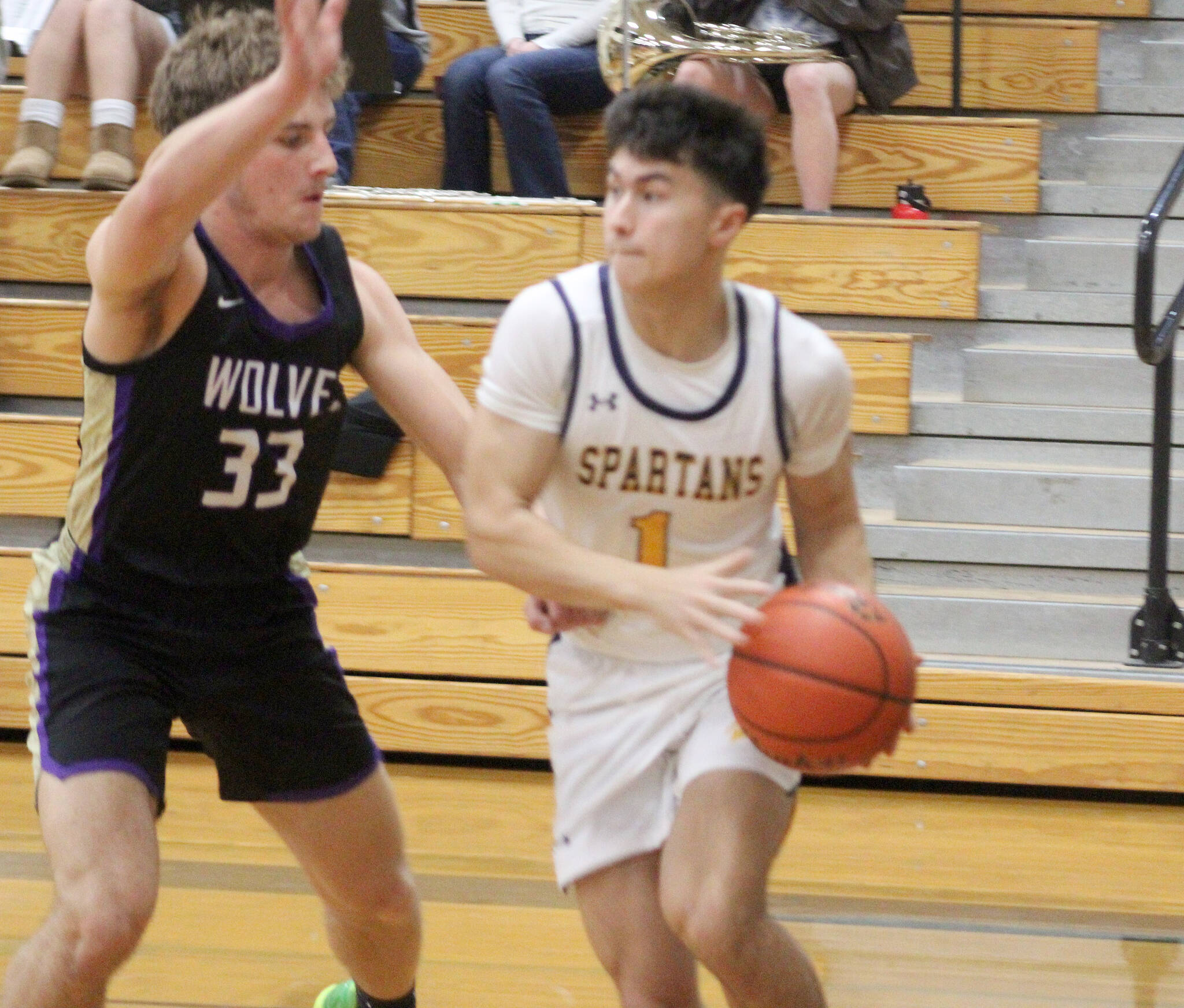Spartan Haden Fink looks to make a play in a 55-42 Bainbridge home win over Sequim Jan. 23.