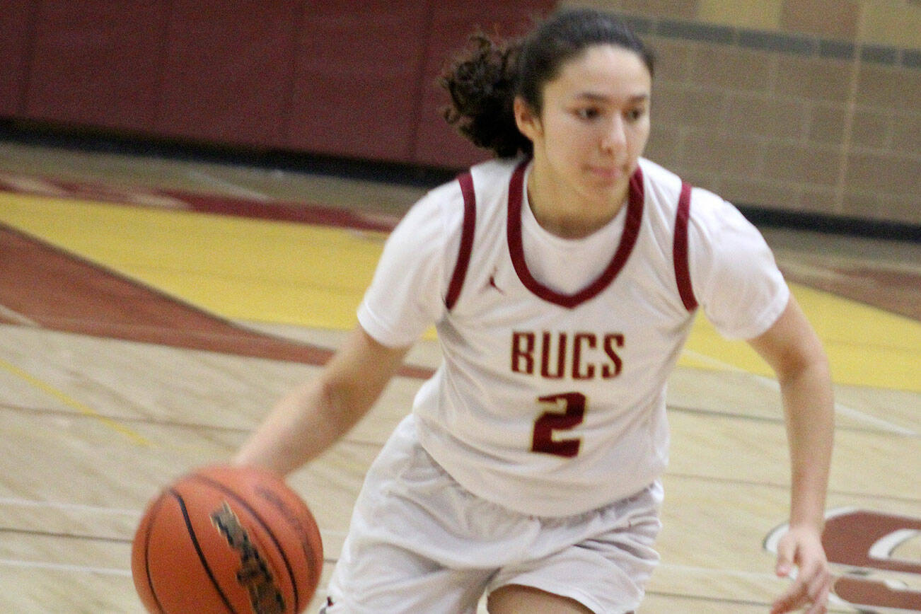 Buccaneer Taizah Franklin brings the ball up the court in a 60-36 Kingston home loss to Bainbridge Jan. 30.
