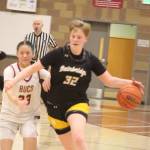 Luke Caputo/Kitsap News Group photos
Spartan Anna Rowe pushes the ball down the court in a 60-36 Bainbridge road win over Kingston Jan. 30.
