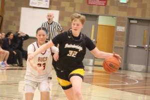 Luke Caputo/Kitsap News Group photos
Spartan Anna Rowe pushes the ball down the court in a 60-36 Bainbridge road win over Kingston Jan. 30.