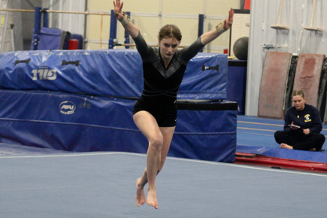Kingston Buccaneer Indigo Pavey prepares to complete her floor routine at the district gymnastics meet Feb. 6 in Lacey.