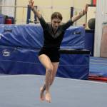 Kingston Buccaneer Indigo Pavey prepares to complete her floor routine at the district gymnastics meet Feb. 6 in Lacey.