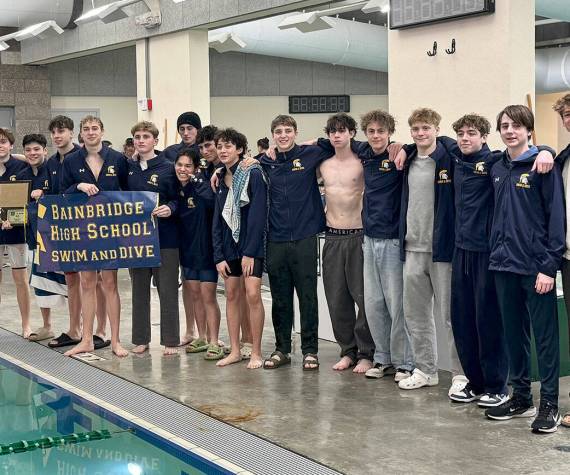 <p>Krista Pal courtesy photo</p>
                                <p>The Bainbridge Spartans celebrate their first-place finish at the 1A/2A district boys swim and dive championships Feb. 14 in Port Angeles.</p>