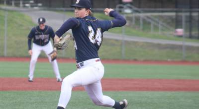 Luke Caputo/Kitsap News Group photos
Spartan McCrea Curfman throws a pitch in a 4-1 Bainbridge win over Olympic March 17 at the Kitsap County Fairgrounds.