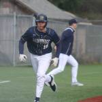 Spartan Will Rohrbacher rounds third base in a 4-1 Bainbridge win over Olympic March 17 at the Kitsap County Fairgrounds.