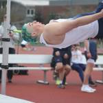 Spartan Grayson Casteel jumps over the bar in the boys high jump event during a track meet at Bainbridge High School March 19.