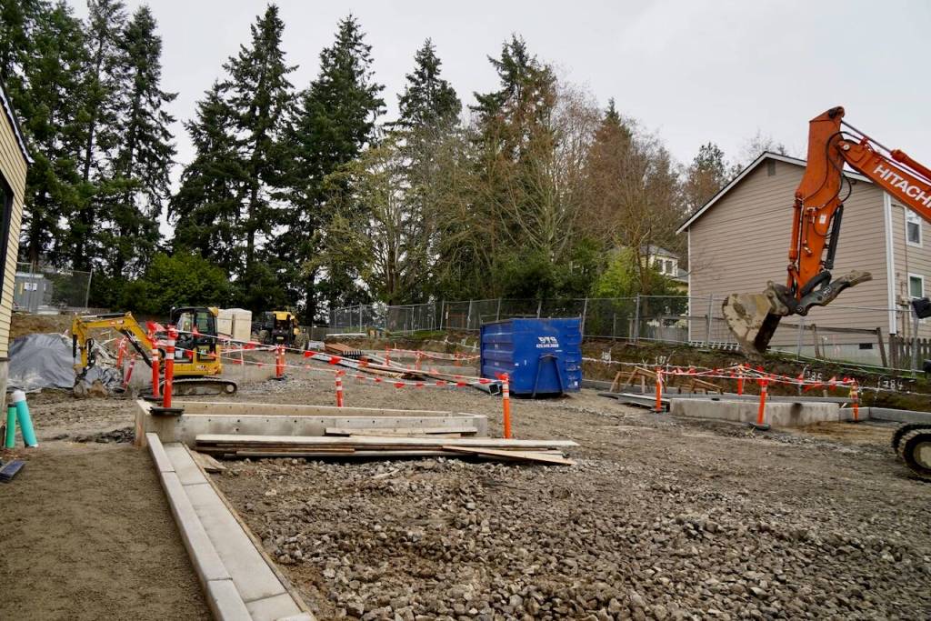 The parking lot will include eight rain gardens.