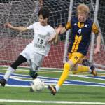 Luke Caputo/Kitsap News Group photos
Spartan midfielder Will Treverton fights for the ball in a 4-0 Bainbridge home win over Port Angeles March 20.