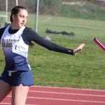 Luke Caputo/Kitsap News Group photos
Spartan Ruby Whitmire receives the baton in the girls 4x200-meter relay in a track and field meet at North Kitsap High School March 26.