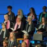 Members of the Bainbridge Chorale on stage at the performance.