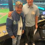 Bainbridge Spartans baseball broadcaster Joah Blair with longtime Mariners radio broadcaster Rick Rizzs April 11 at T-Mobile Park in Seattle.