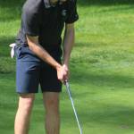 Luke Caputo/Kitsap News Group photos
Bainbridge Spartan Samuel Patterson putts his ball during the Olympic League Golf Championships May 4 at Kitsap Golf & Country Club in Bremerton.