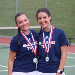 Luke Caputo/Kitsap News Group photos
Bainbridge Spartans Abby Schnee (left) and Elsa Drugge (right) celebrate their first-place doubles finish at the Olympic League Girls Tennis Tournament May 8 at North Kitsap High School.