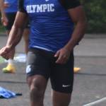 Olympic Trojan Chace Webster competes in the boys triple jump event May 9 at the Olympic League Championships at North Mason High School.