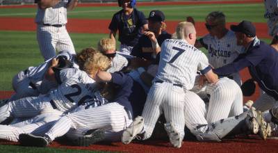 Luke Caputo/Kitsap News Group photos
The Bainbridge Spartans celebrate after Tenzing Dikmans walk-off RBI to seal the state championship in a 1-0 win over Tumwater May 30 at Joe Martin Stadium in Bellingham.
Luke Caputo/Kitsap News Group photos
The Bainbridge Spartans celebrate after Tenzing Dikmans walk-off RBI to seal the state championship in a 1-0 win over Tumwater May 30 at Joe Martin Stadium in Bellingham.