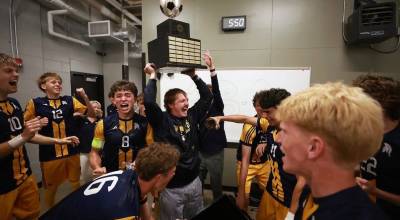 Mark Nowak courtesy photo
The Bainbridge Spartans celebrate in the locker room after winning their first state title in boys soccer since 2013 May 30 at Federal Way Memorial Stadium.